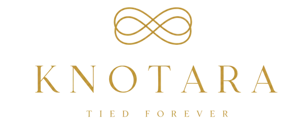 Gold logo for KNOTARA with an infinity symbol above the brand name and the tagline 'TIED FOREVER' on a light cream background.
